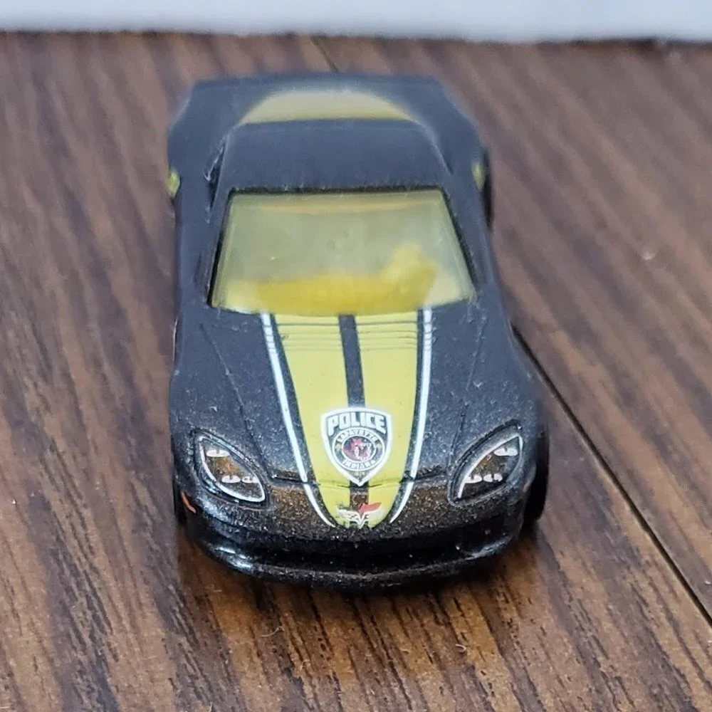 Hot Wheels 2011 C6 Corvette HW Main Street City of Lafayette Police Black